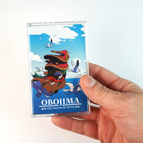 ObojimaCassetteInHand_OnWhite_